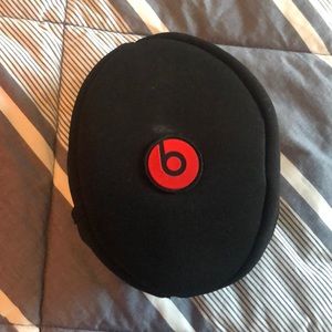 Navy blue Wireless Beats headphones